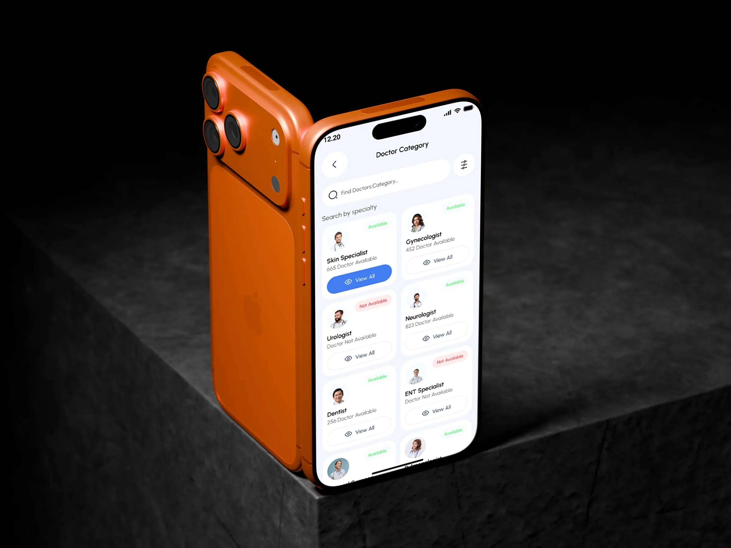 MediBook doctor categories on an orange phone standing on dark stone